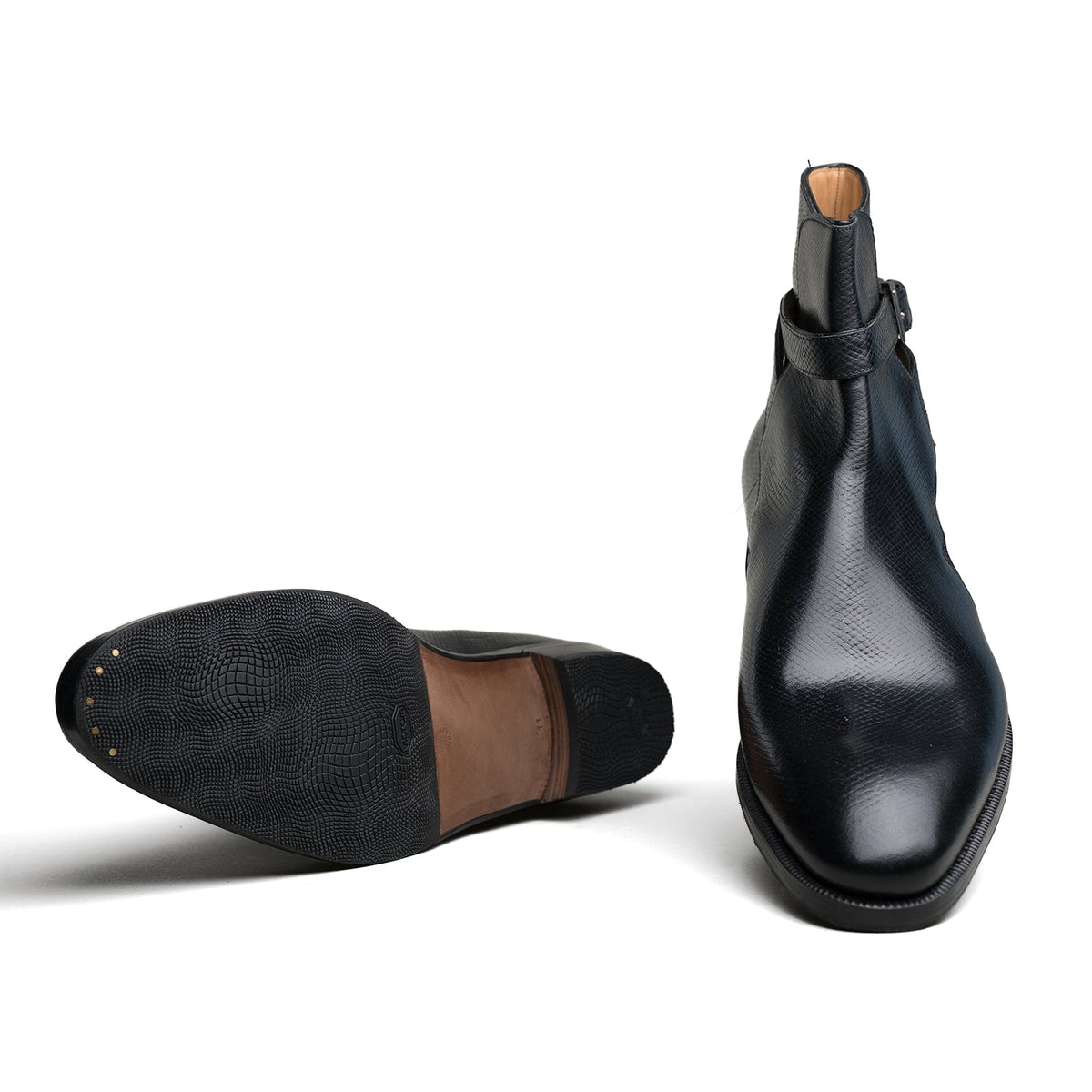 The detail on the sole of a Black Hatchgrain pair of shoes