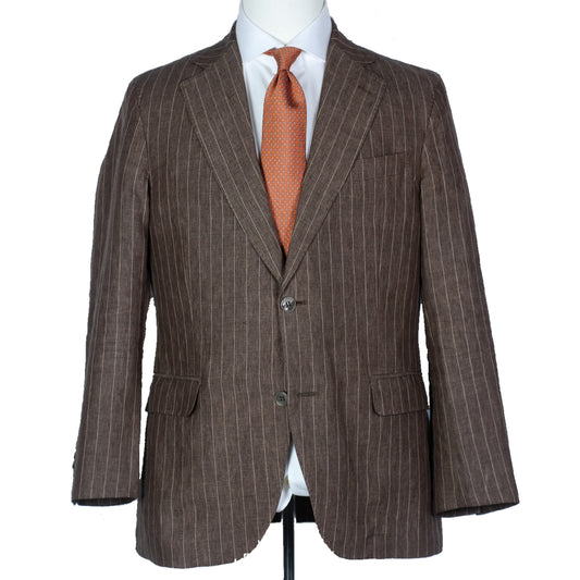 Brown pinstripe suit jacket on a mannequin with a white shirt and orange tie.